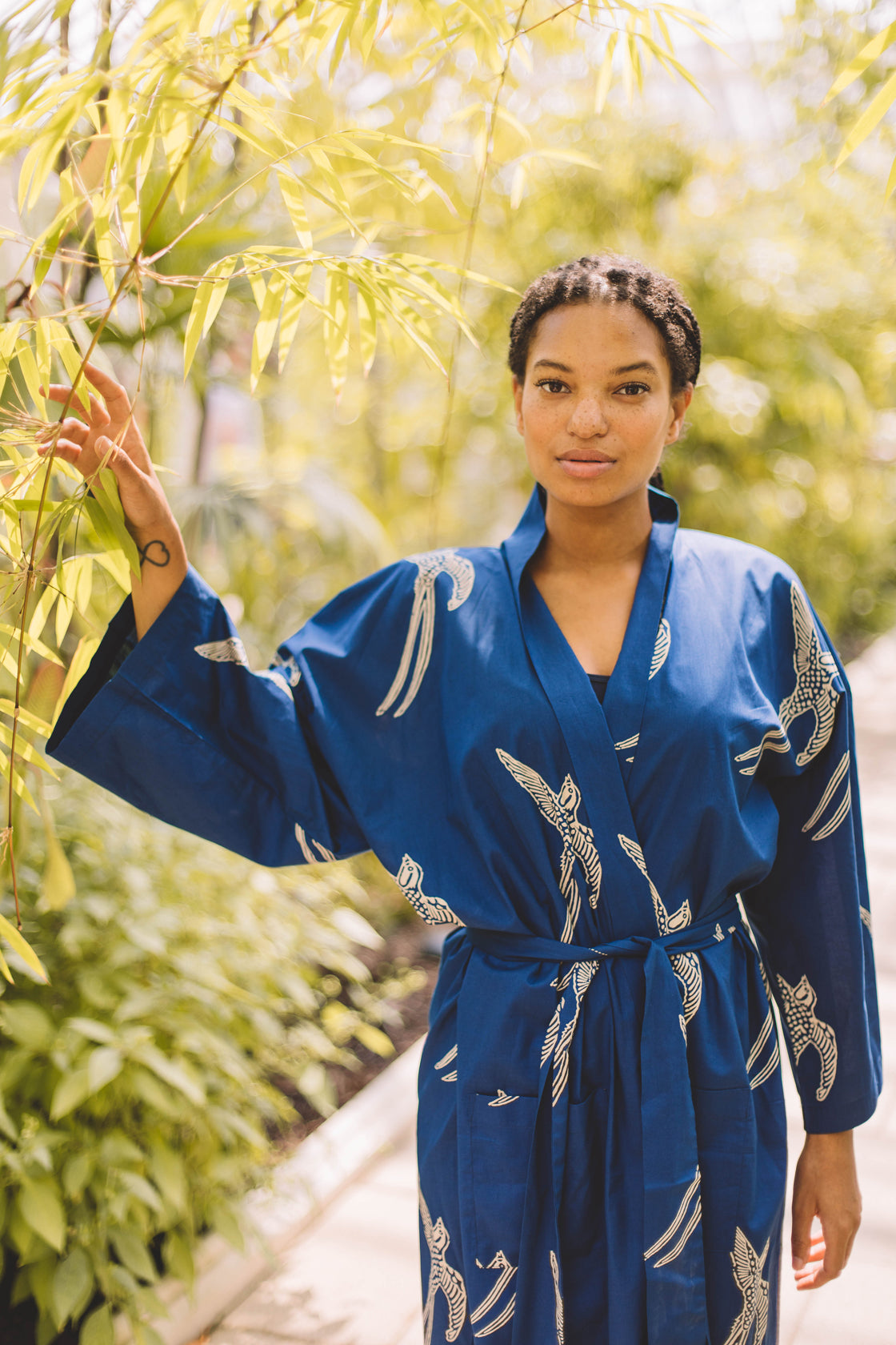 Reaching into bamboo, garden lifestyle